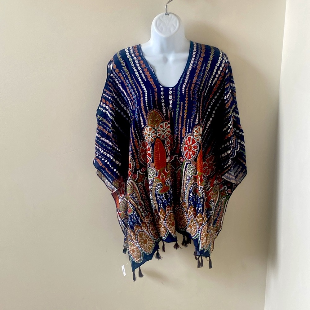 Wrap/beachware lightweight ponco style. New with tags. Viscose fabric.